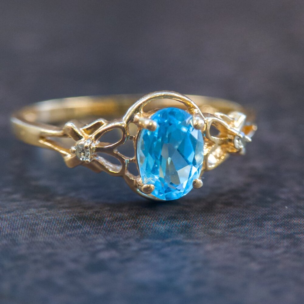 14k Gold Oval Blue Topaz Ring with Diamond Accents